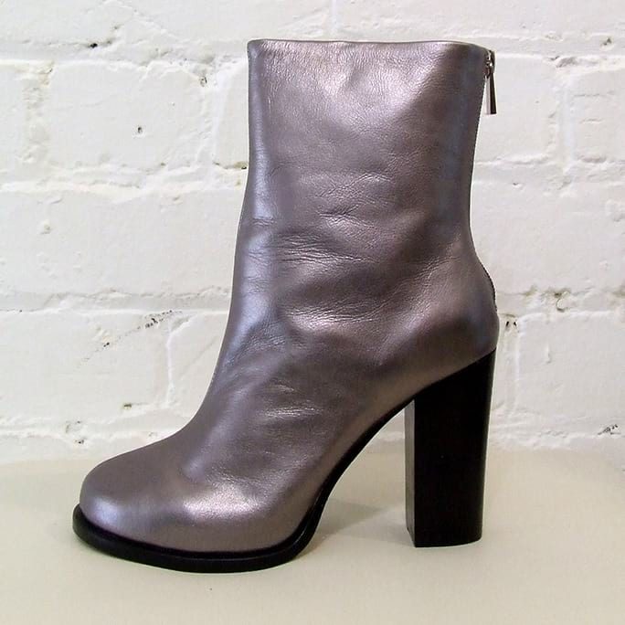 Silver leather calf-length boot.