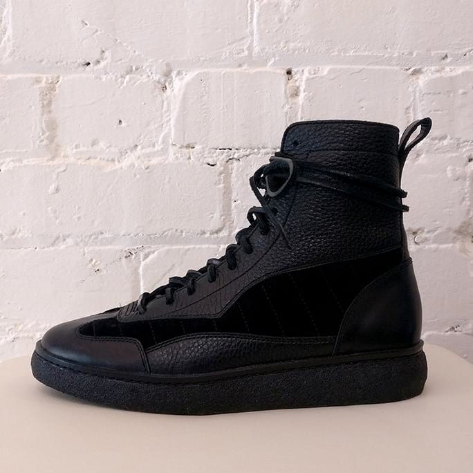 Eden high top sneakers, black leather with suede panels. Has original box.
