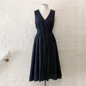 Cotton check flared dress with belt.