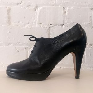 Leather lace-up shoe boots.