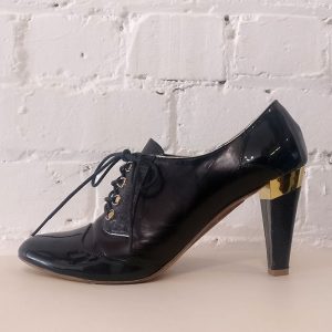 Leather lace-up shoes.