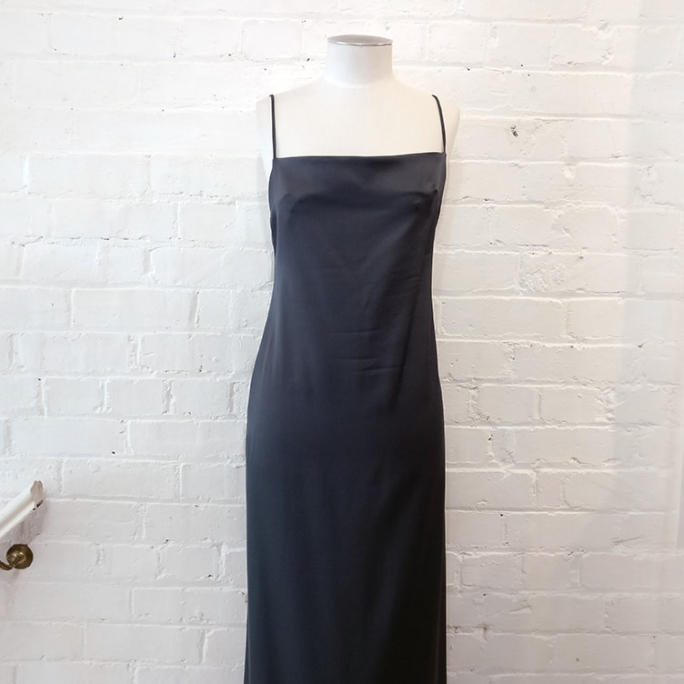 Long slip dress with spaghetti straps.