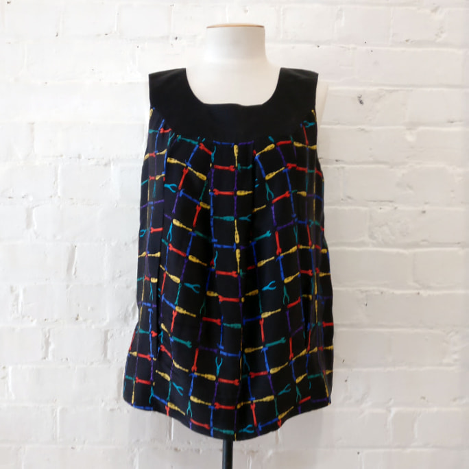 100% silk top with multi-coloured tool print.