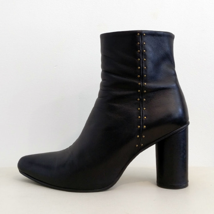 Ankle boot with stud detailing and Margiela-inspired heel.