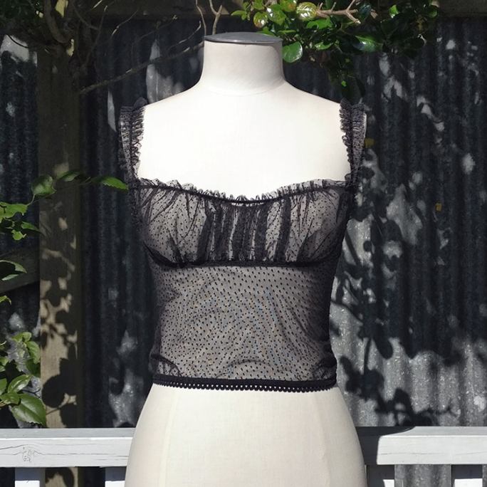 Black lacy top.