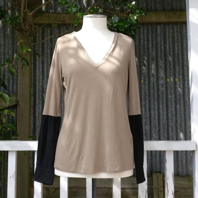 V-neck top with short sleeves.