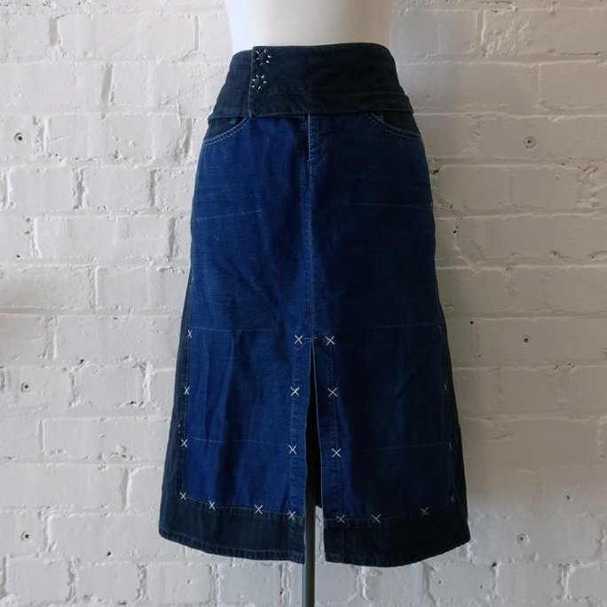 A-line denim skirt with embroidery detail, unlined.