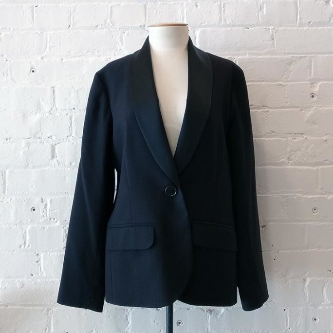 Wool mix jacket with tuxedo lapel.