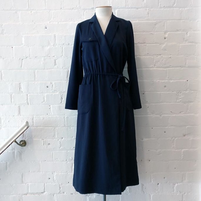 Wrap dress with patch pockets and belt.
