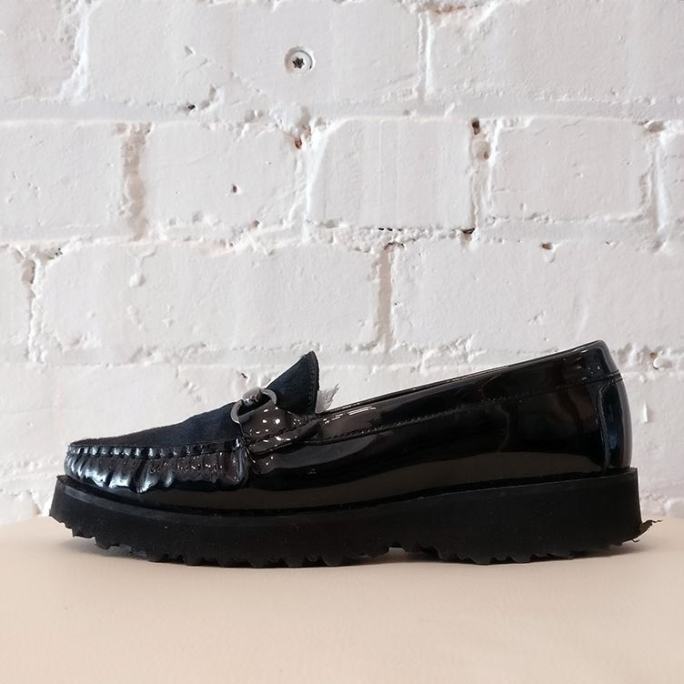 Platform patent leather loafer with cow hide upper.