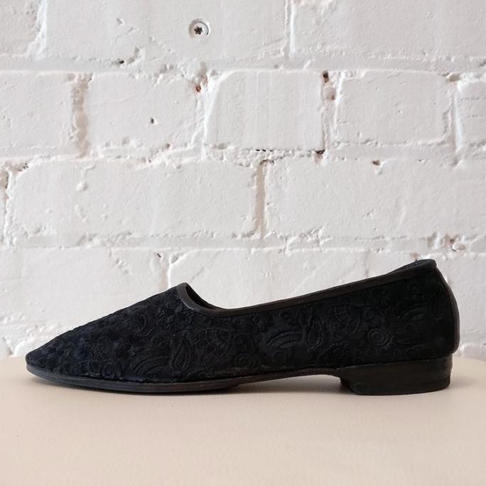 Brocade slip-on, leather lined, with box.