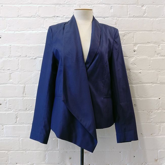 Lined silk jacket with asymmetric lapel. Original price tags still on!
