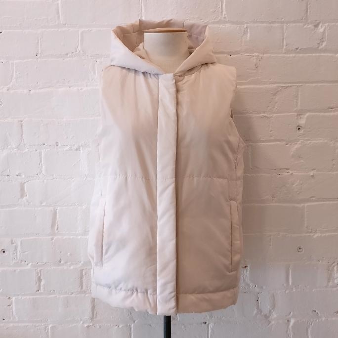 Sleeveless hooded puffer vest, cotton lined.