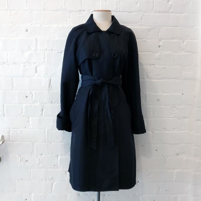 Classic trench coat, showerproof and fully lined.