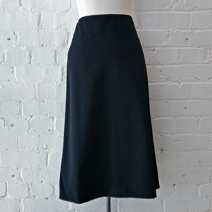Lightweight A-line nylon skirt with contrast stitch. Vintage 2001.