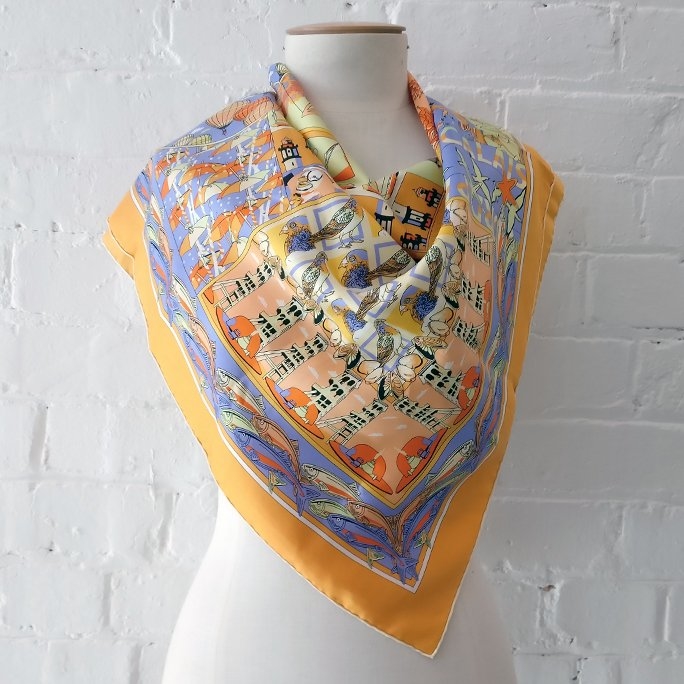 Silk scarf with hand-rolled edges.