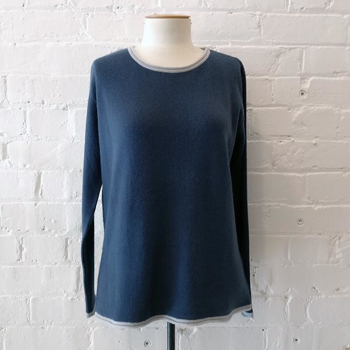 Cashmere blue-grey knit with contrast trim.