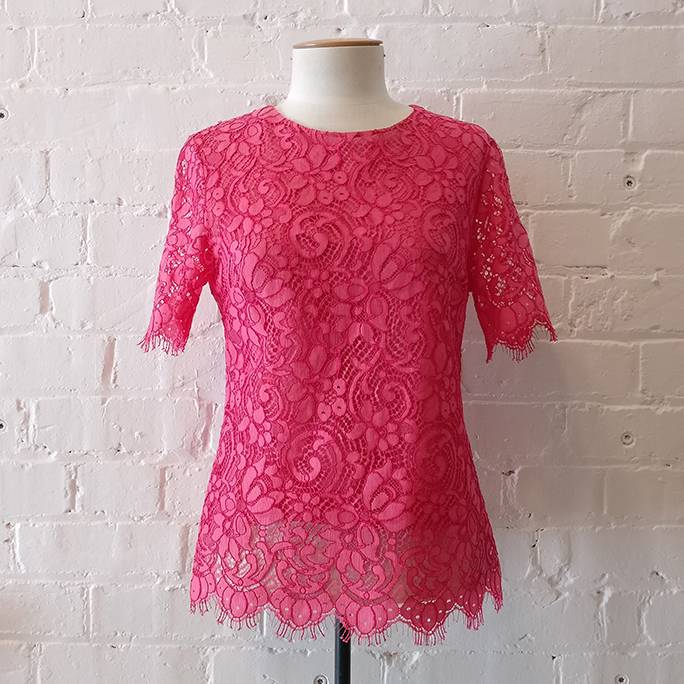 Silk lined cotton lace short sleeve top.