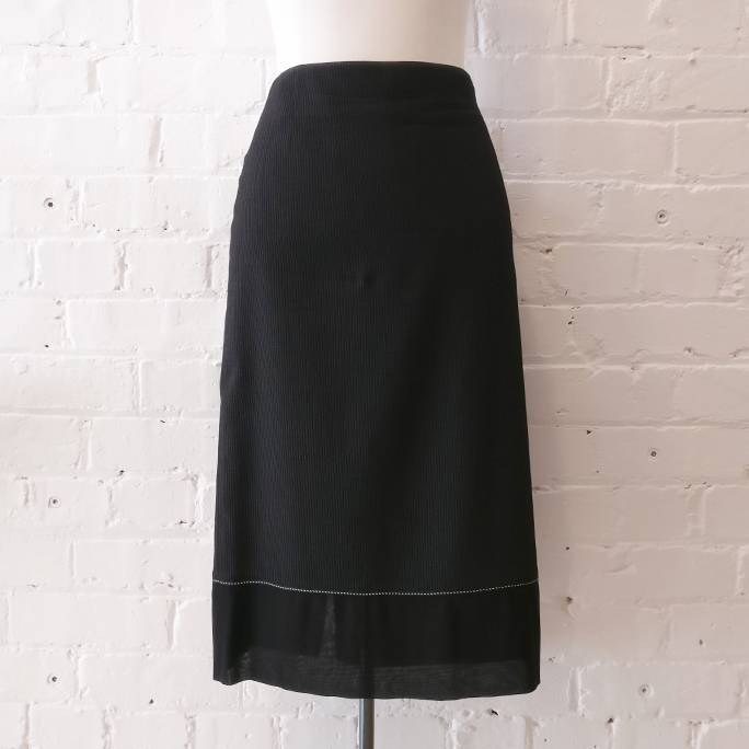 Mid-length skirt with ribbon trim, fully lined. 2001 vintage.