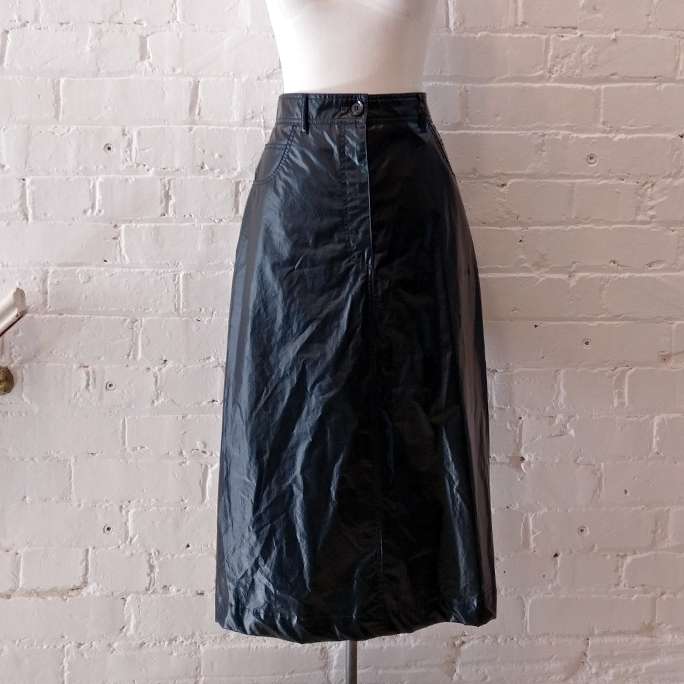 PVC jean-style skirt with pockets.