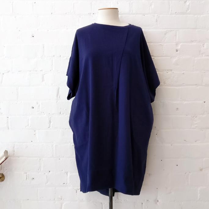Navy t-shirt dress with pockets, semi-lined.