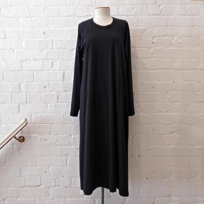 Flared long sleeve dress with crew neck.