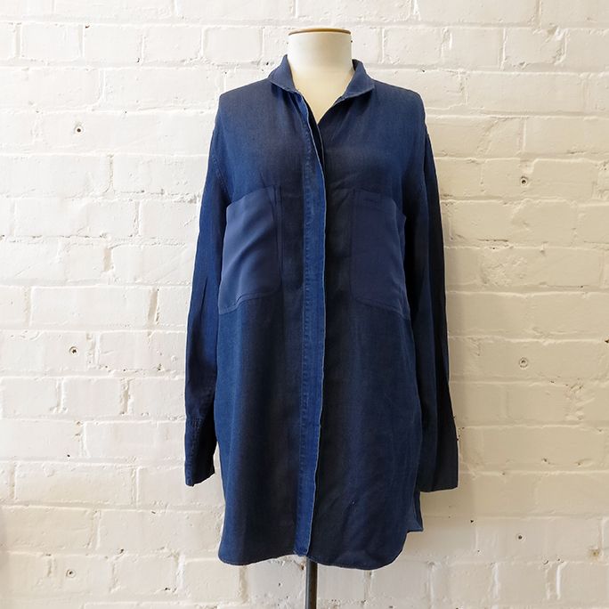 Oversize dark chambray shirt with patch pockets.