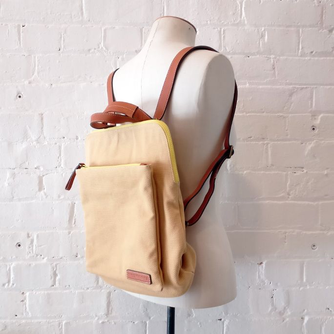 Versatile backpack with handle and multiple pockets.