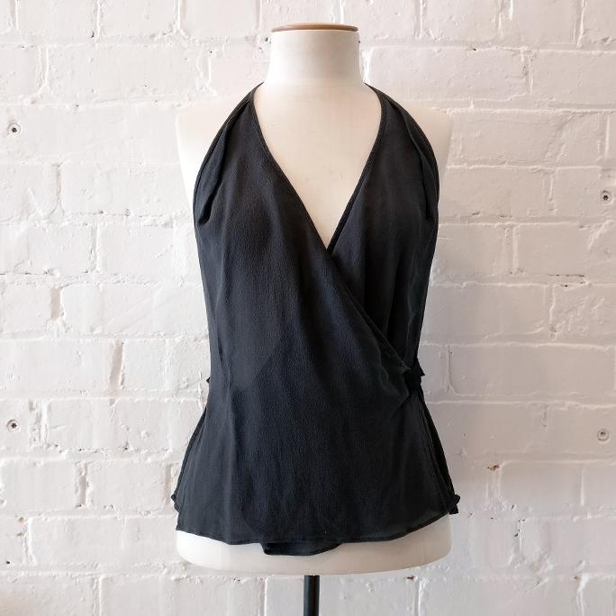 "X-Over" sheer silk top.<br><a href="https://fashionrecovery.co.nz/zambesi-x-over-black-top-size-10/">Also available in black</a>.