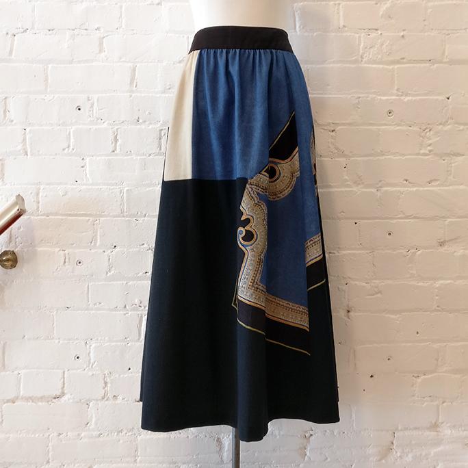 Wool mix full skirt with pockets.