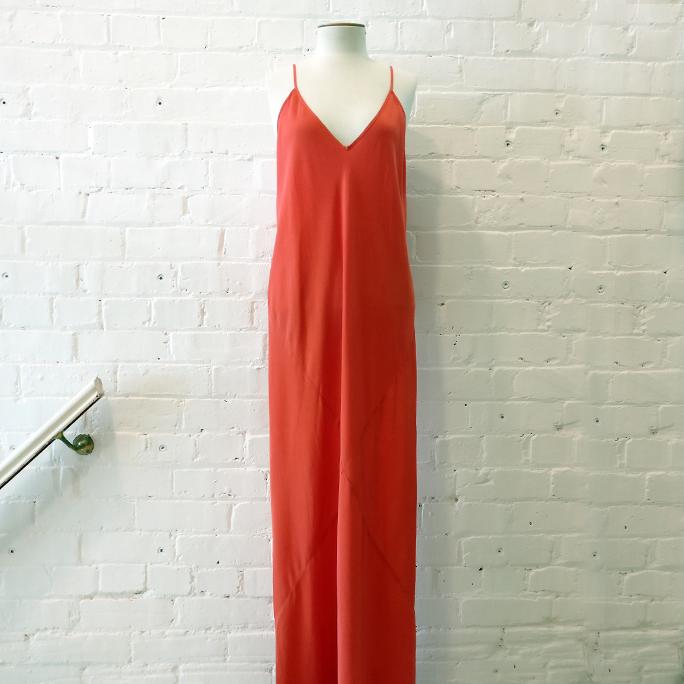 Floor-length bias-cut slip dress.