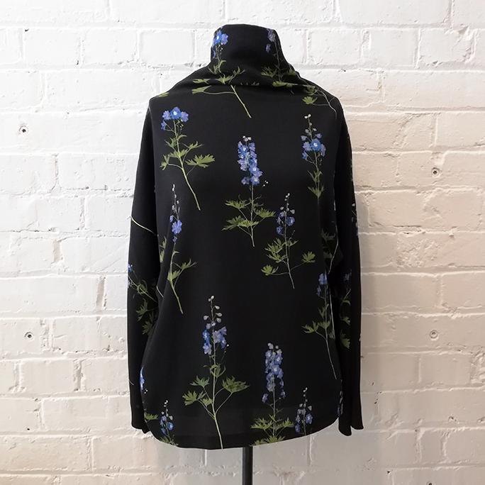 High neck top with shoulder zip and botanical print.