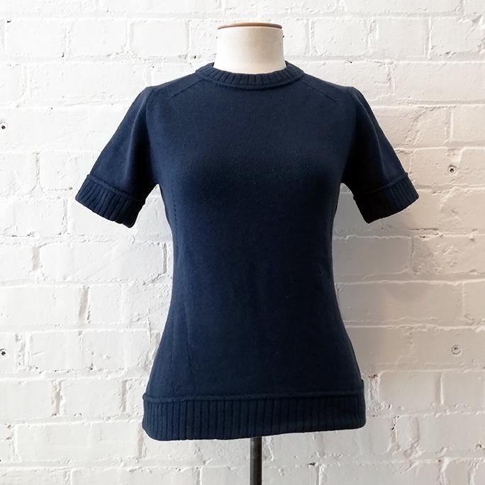 Short sleeve shaped knit.