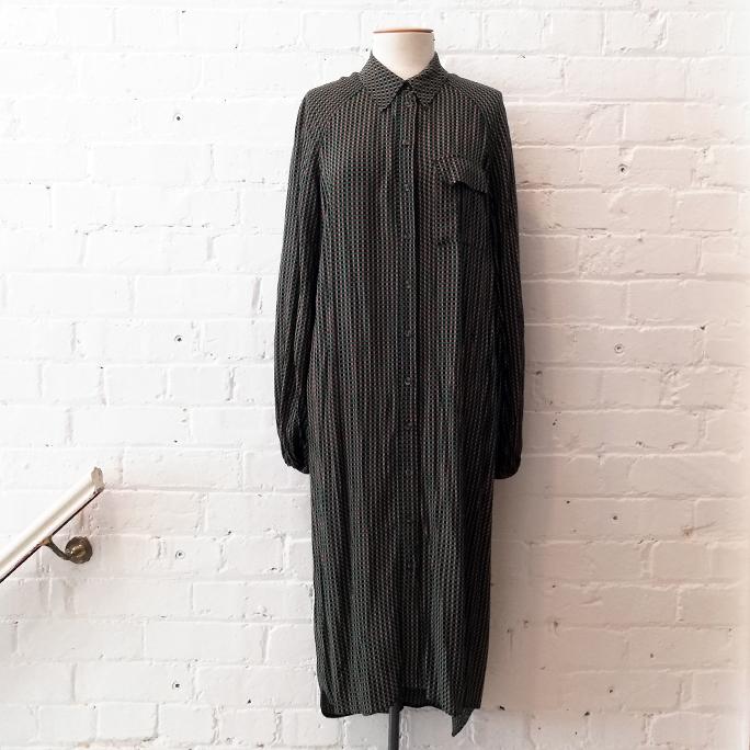 Shirt dress with patch pocket.