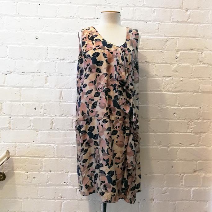 Floral silk print sleeveless dress with pocket.