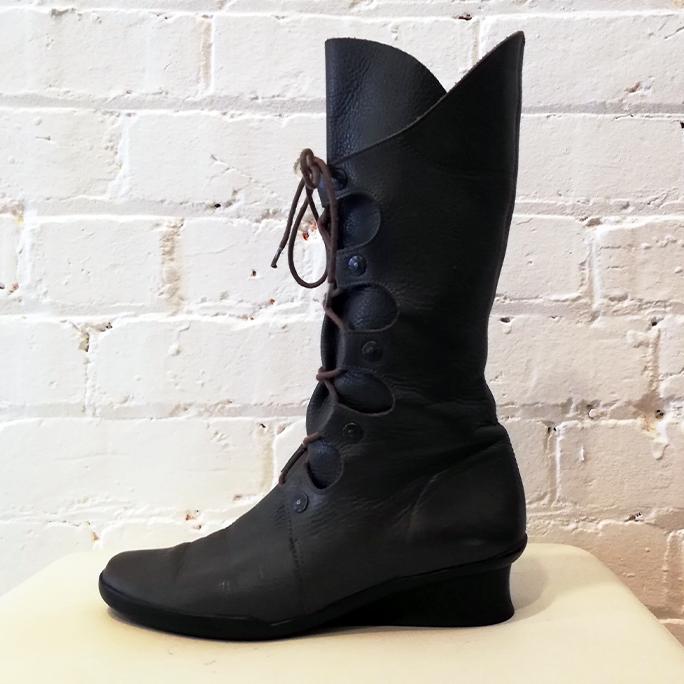 Lace-up wedge boot.