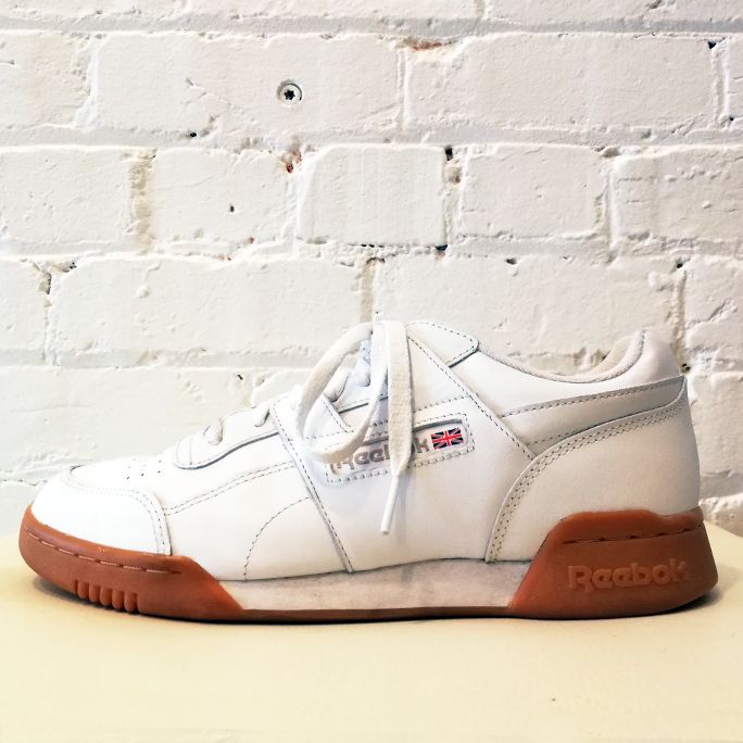 White leather sneaker with gum sole.