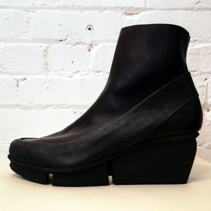 Platform ankle boot with rubber sole.