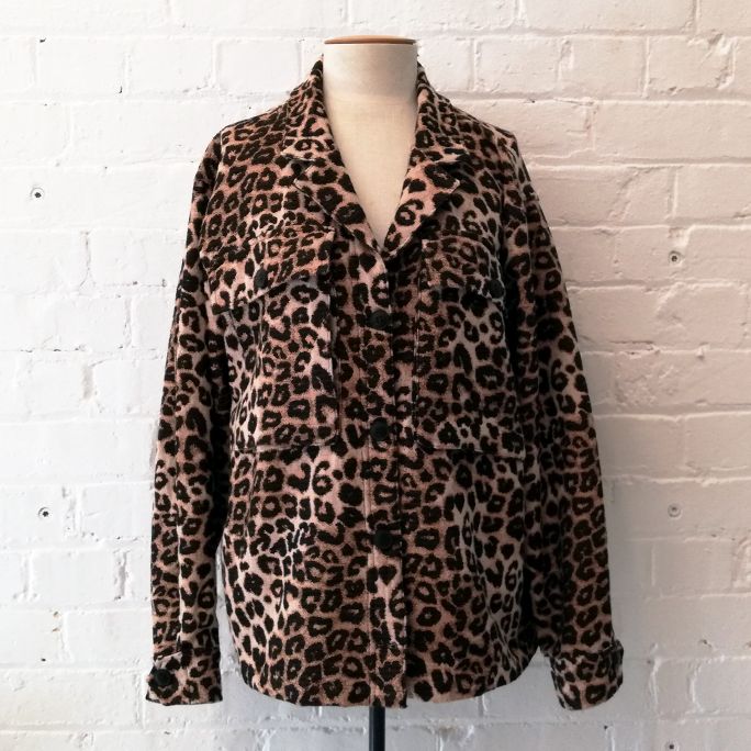 Animal print shirt jacket with oversize patch pockets, unlined.