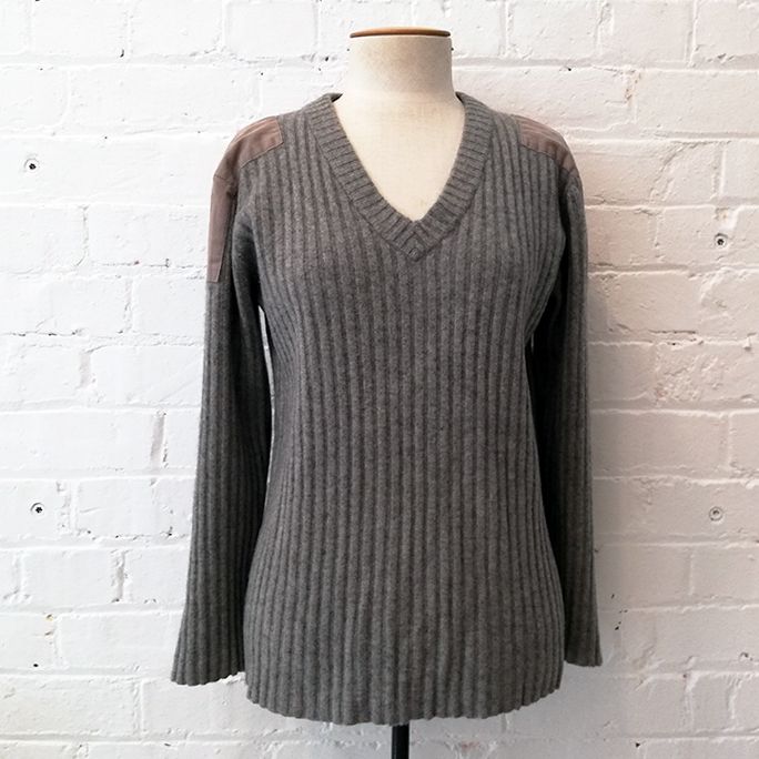 Wool knit with shoulder and elbow patches.