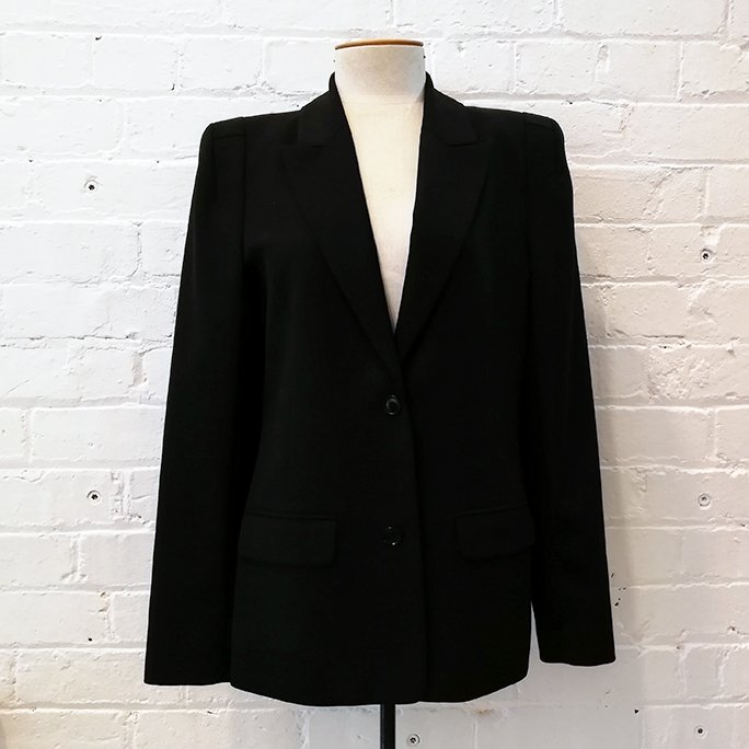 Two-button black wool jacket.