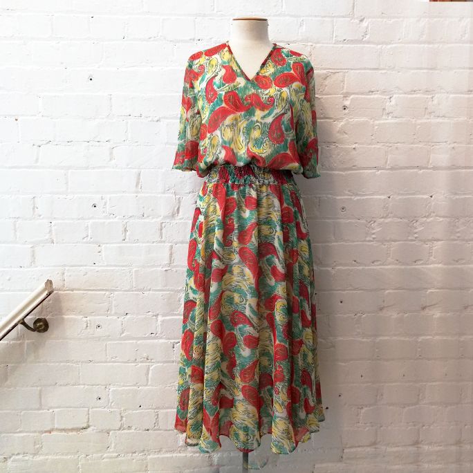 Vintage paisley print sun dress, half lined.