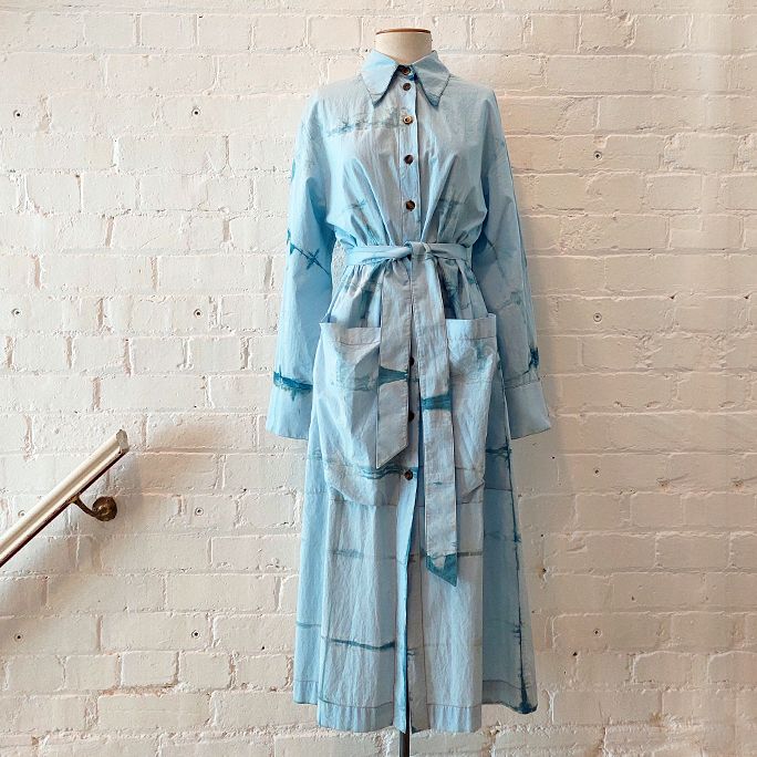 Cotton duster coat-style dress with large patch pockets.