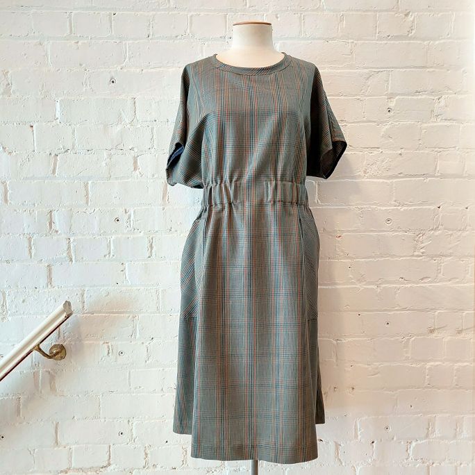 Wool mix short sleeve dress with patch pockets.