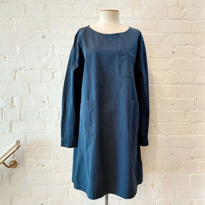 Oversize smock dress with 3 patch pockets.