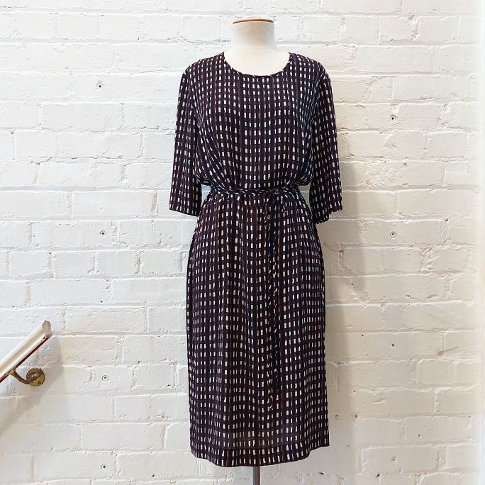 Short-sleeve patterned shift dress.