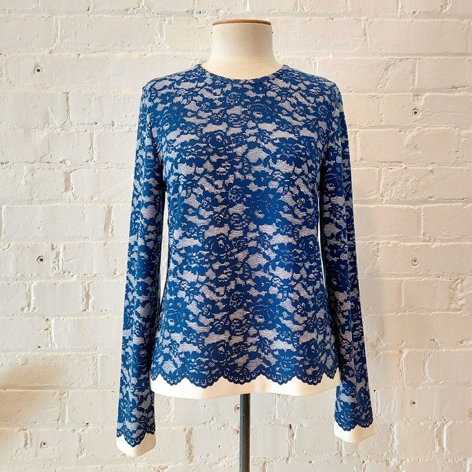 Lace print crew neck top.