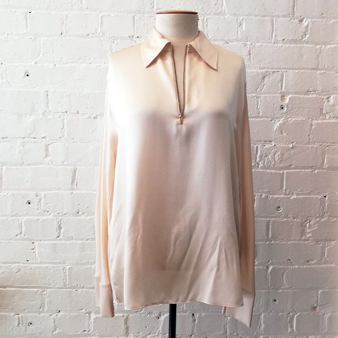 Zip front stretch silk shirt.