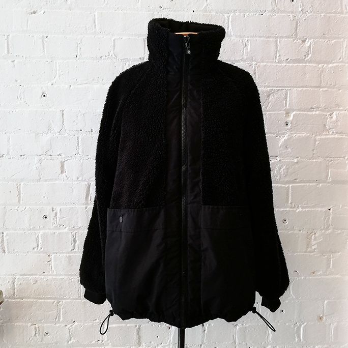 Reversible faux fur rain jacket.