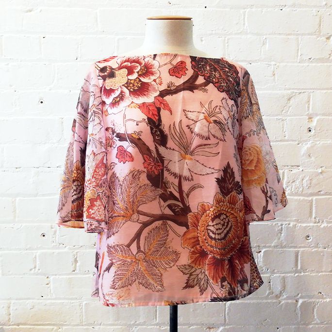 Floral top with flared sleeve, half-lined.